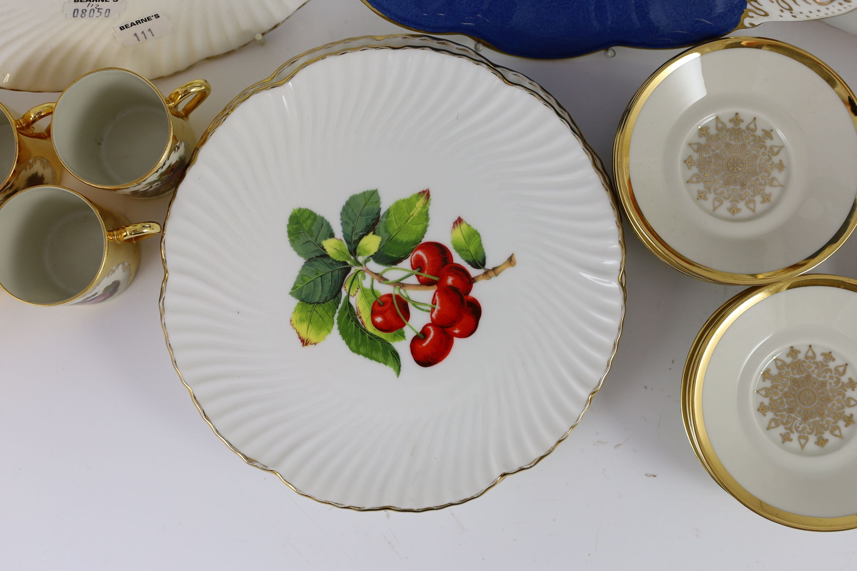 A set of eight German gold ground coffee cans and saucers